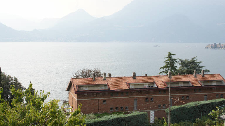 Basilico, Sabrina - 2014. Primary subject is Residence per le famiglie di quattro fratelli in Varenna, in the Fiumelatte area. The surrounding environment shows the urban or architectural context of the building, with the work presented as the main focus.